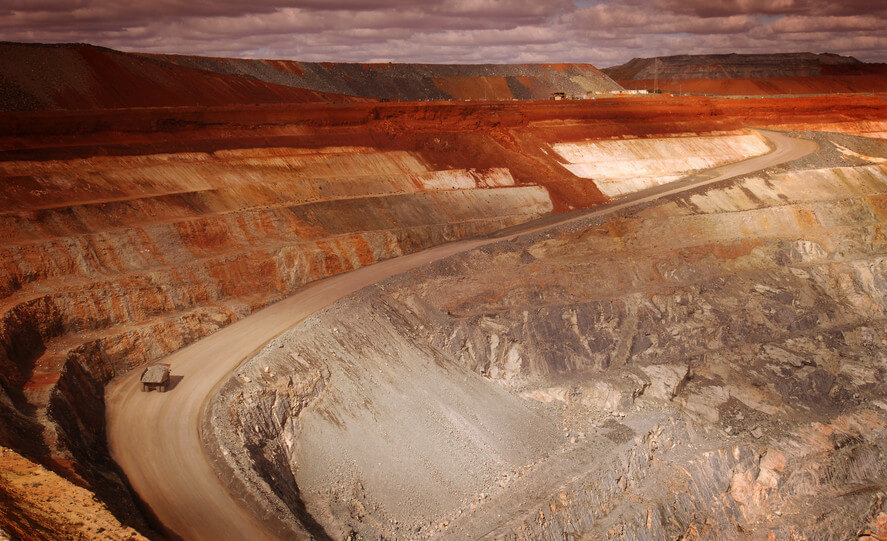 Wide angle elevated view of an open cut mine.